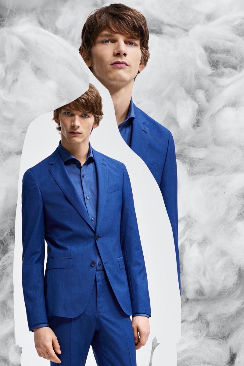 Erik Van Gils dons a blue suit from BOSS' Responsible Tailoring collection.