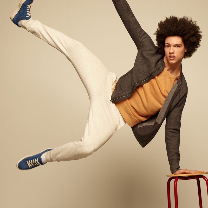 Making a case for sporty, relaxed style, Gabriel Gomieri wears joggers with a sweatshirt and jacket by Banana Republic.