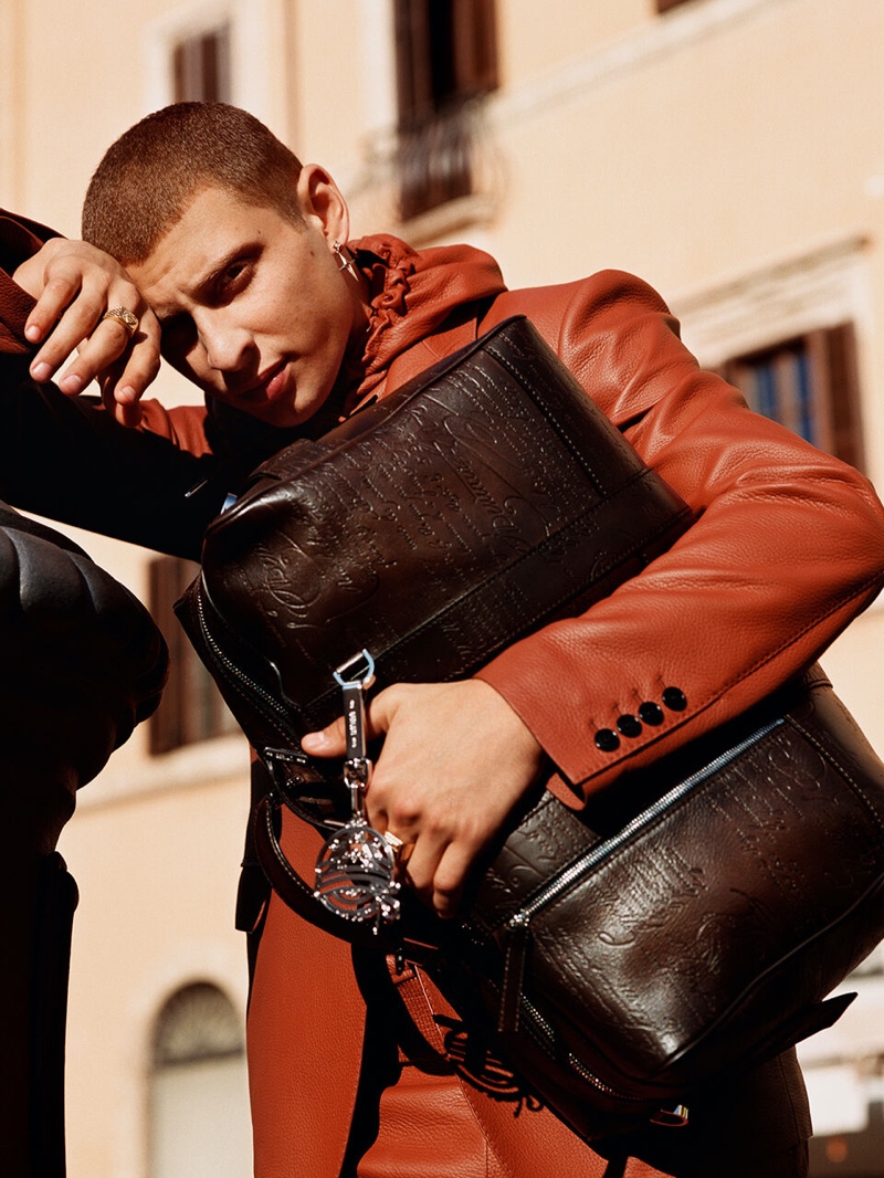 Donning a modern leather look, Blondey McCoy appears in Berluti's spring-summer 2020 campaign.