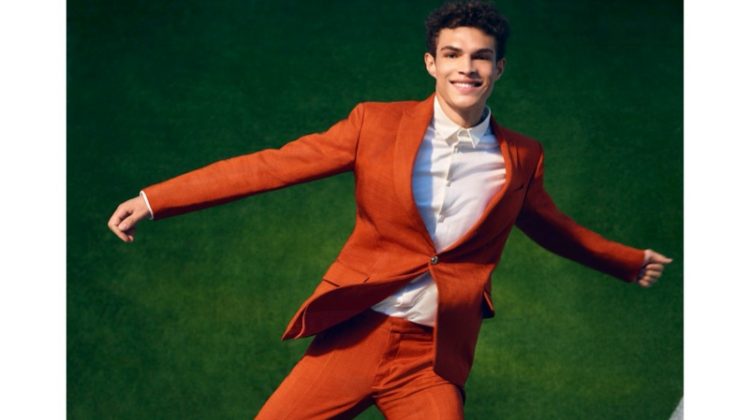 All smiles, Noah Luis Brown dons a colorful suit for Brandon Maxwell's spring-summer 2020 campaign.