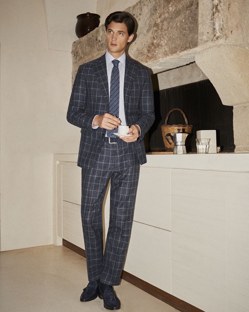 Garrett Neff dons a checked suit for Canali's spring-summer 2020 campaign.