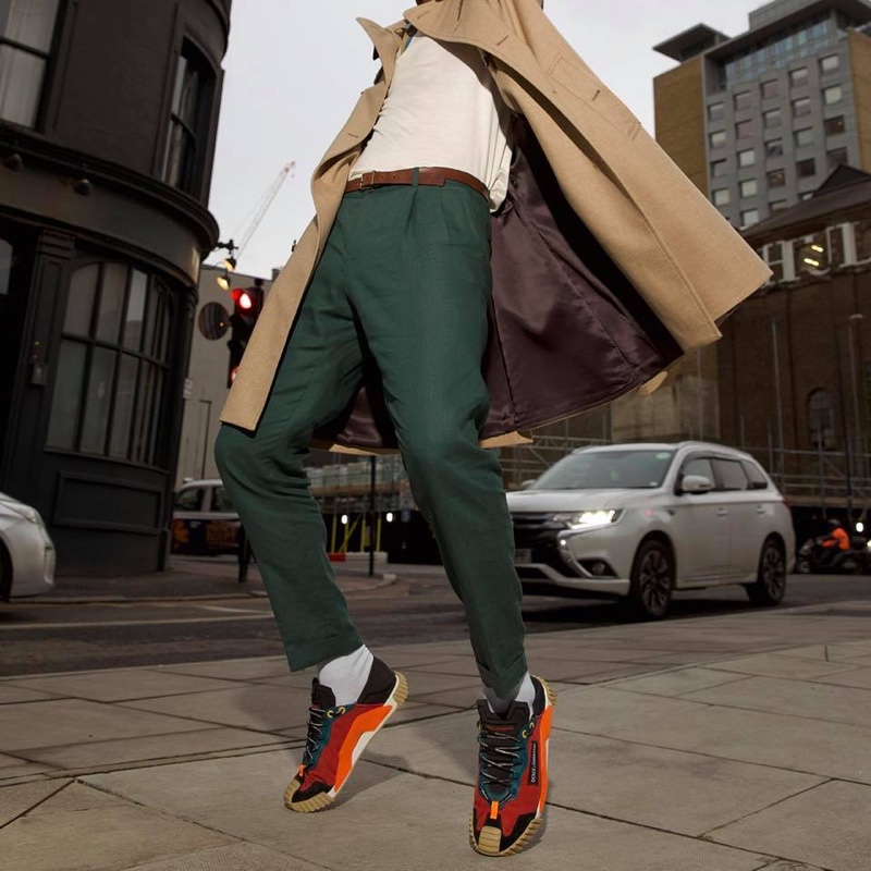 Model Sacha M'Baye wears Dolce & Gabbana's NS1 slip-on sneakers.