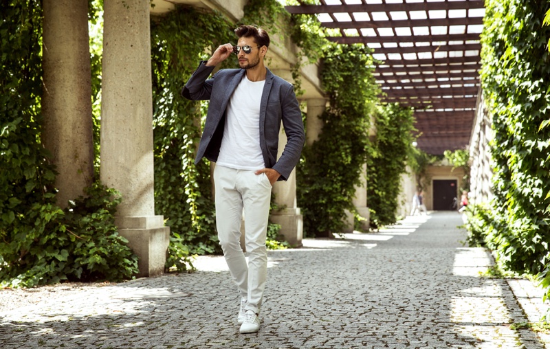 Fashionable Male Model Walking Outside