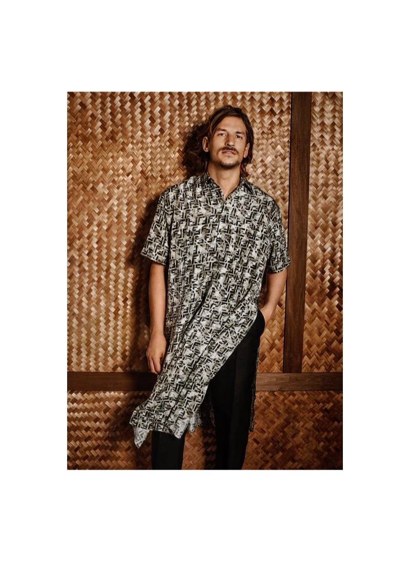 Jarrod Scott wears a silk shirt and cotton pants by Fendi for Holt Renfrew.