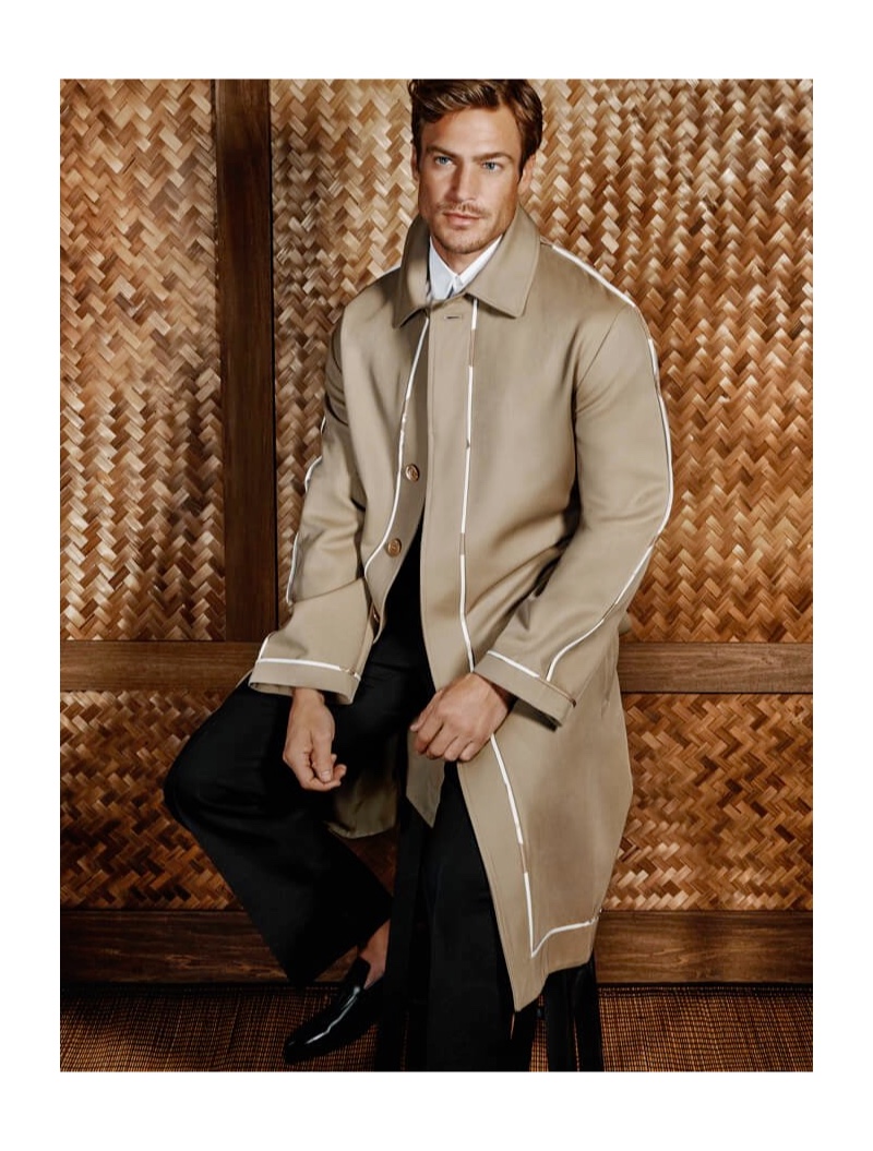 Jason Morgan dons a twill overcoat by Fendi for Holt Renfrew.