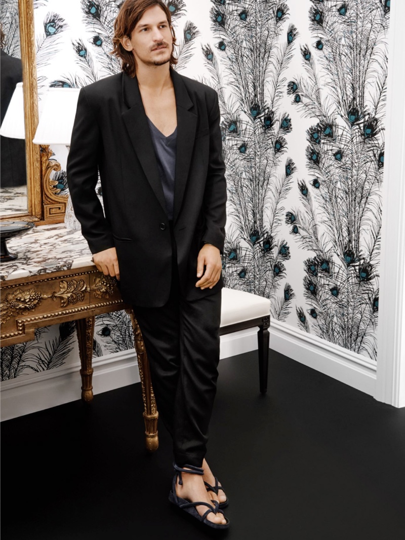 Jarrod Scott dons an Isabel Marant cotton-blend jacket, t-shirt, and pants for Holt Renfrew.