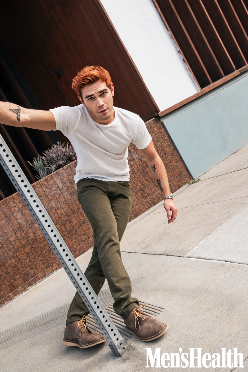 On the move, KJ Apa wears Flint and Tinder jeans with a Velva Sheen t-shirt and Red Wing Heritage boots for Men's Health.