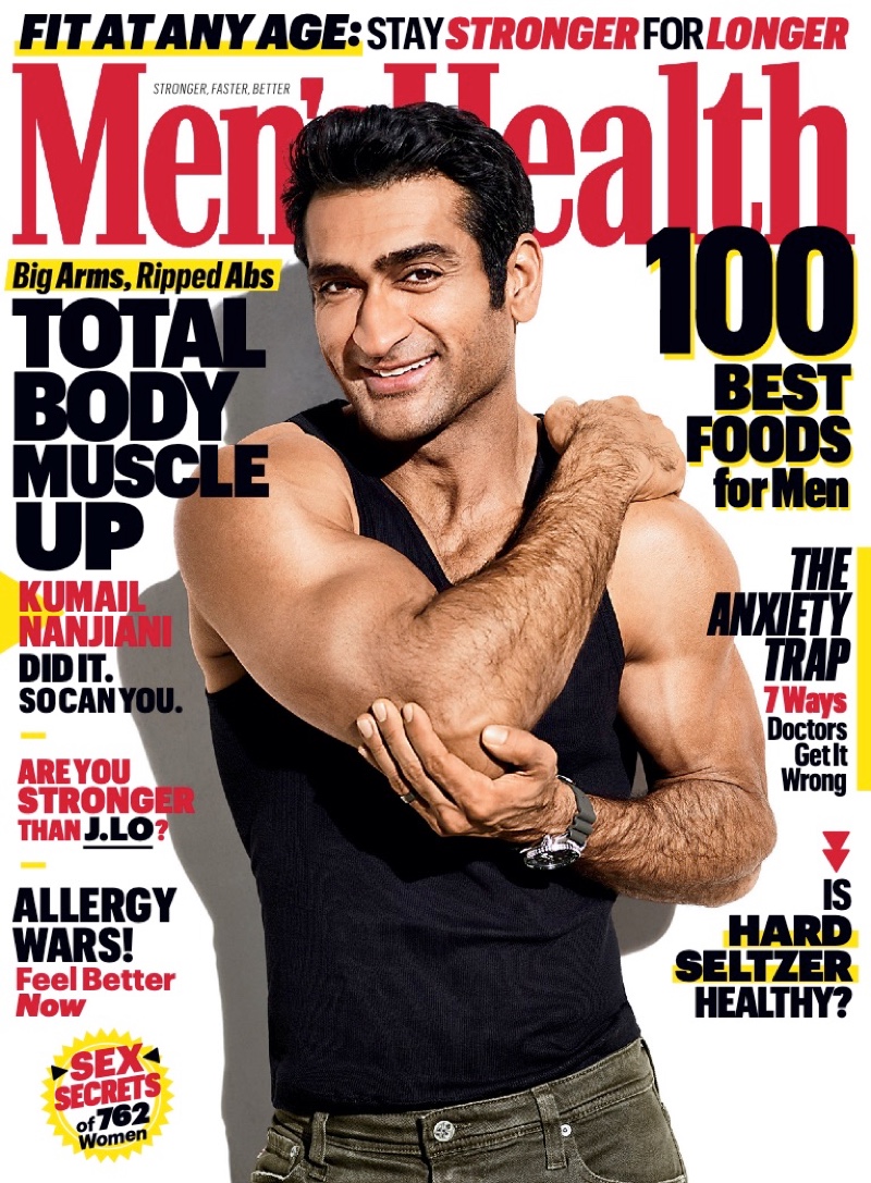 Sporting a black tank and showing his muscles, Kumail Nanjiani covers the April 2020 issue of Men's Health.