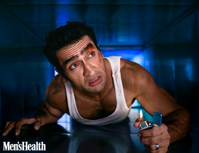 Idolizing the ultimate action star, Kumail Nanjiani recreates a scene from Die Hard, starring Bruce Willis. Gracing the pages of Men's Health, Nanjiani rocks a Hanes tank.