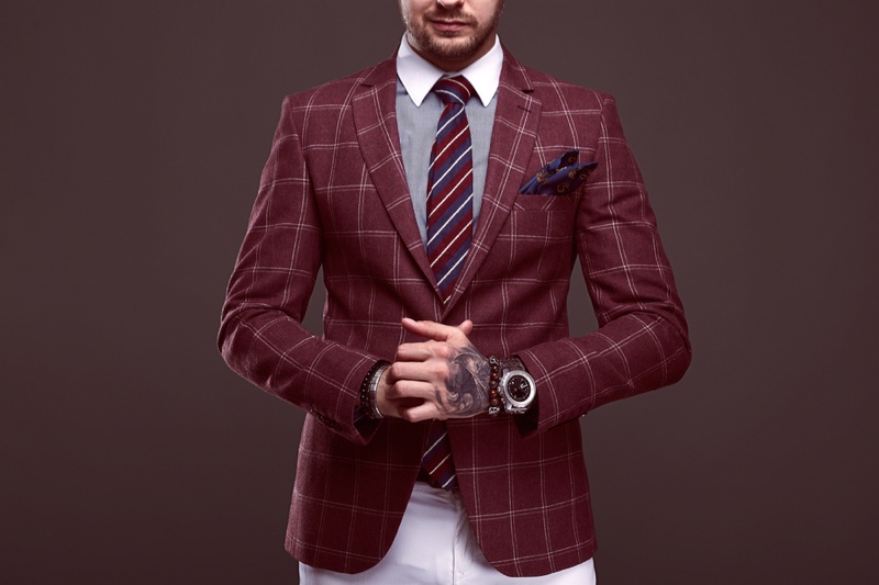 Man in Professional Business Look with Hand Tattoo