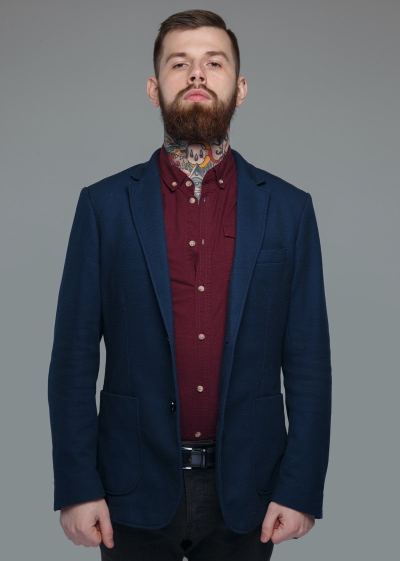 Man in Suit with Neck Tattoo