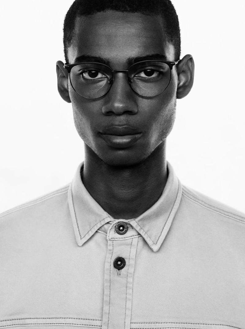 A smart vision in glasses, Keiron Caynes stars in Marc O'Polo's spring-summer 2020 campaign.