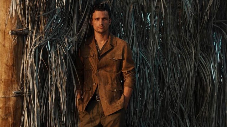 Simon Nessman dons a brown suede shirt jacket for Massimo Dutti's spring-summer 2020 campaign.