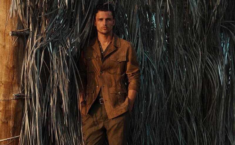 Simon Nessman dons a brown suede shirt jacket for Massimo Dutti's spring-summer 2020 campaign.