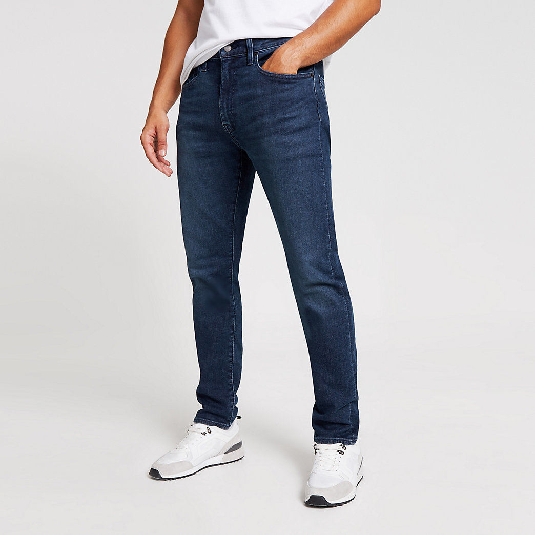 Mens Levi’s dark blue 512 slim fit denim jeans | The Fashionisto