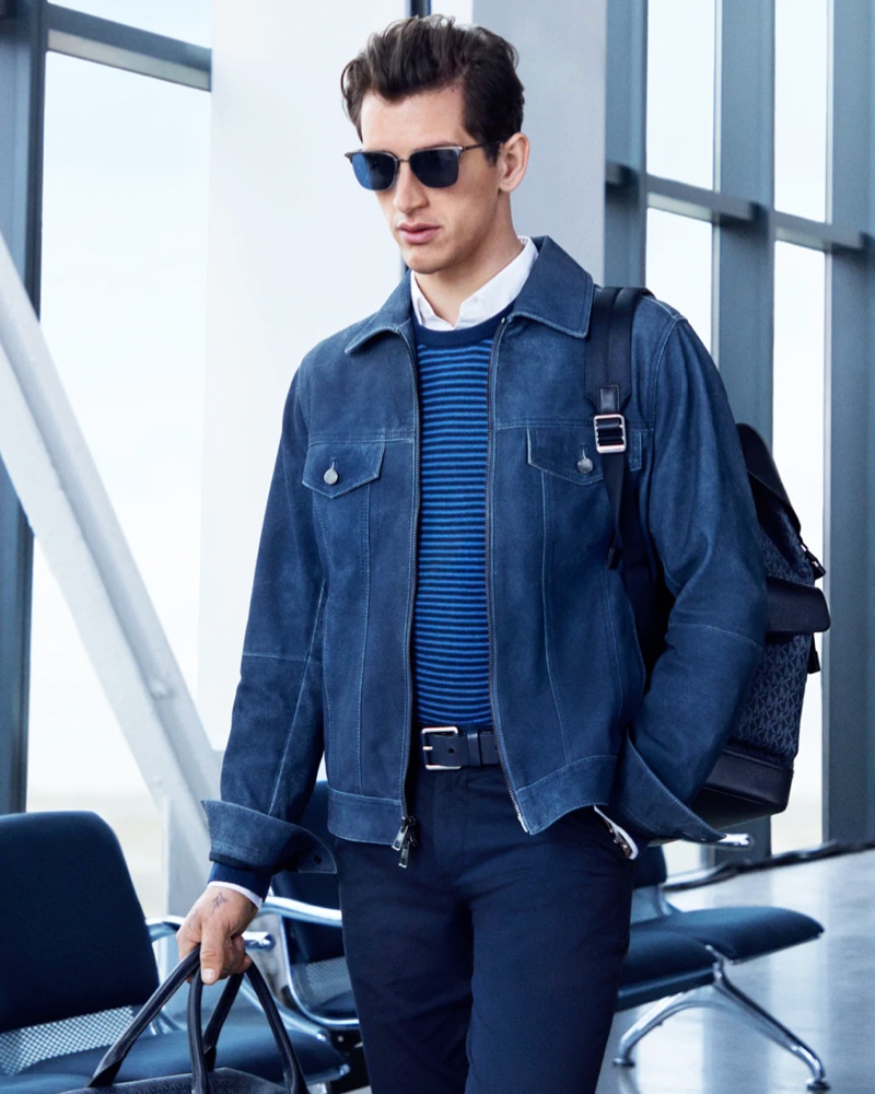 Donning a smart look in navy, Austin Augie stars in Michael Kors' spring-summer 2020 campaign.