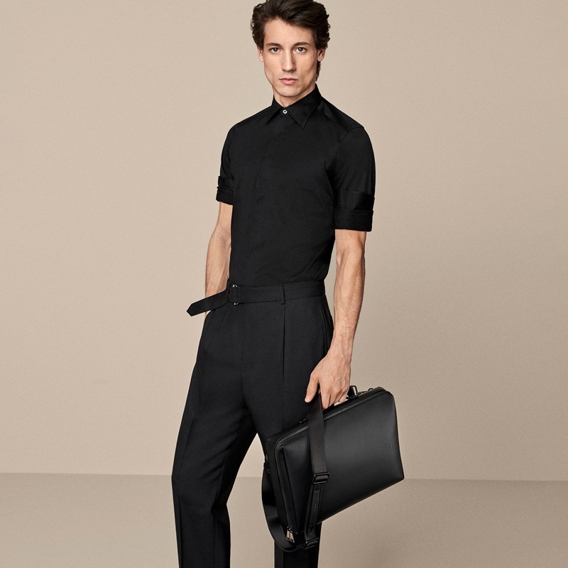 Argentine model Nicolas Ripoll poses with Furla's Mercurio briefcase for the brand's spring-summer 2020 campaign.