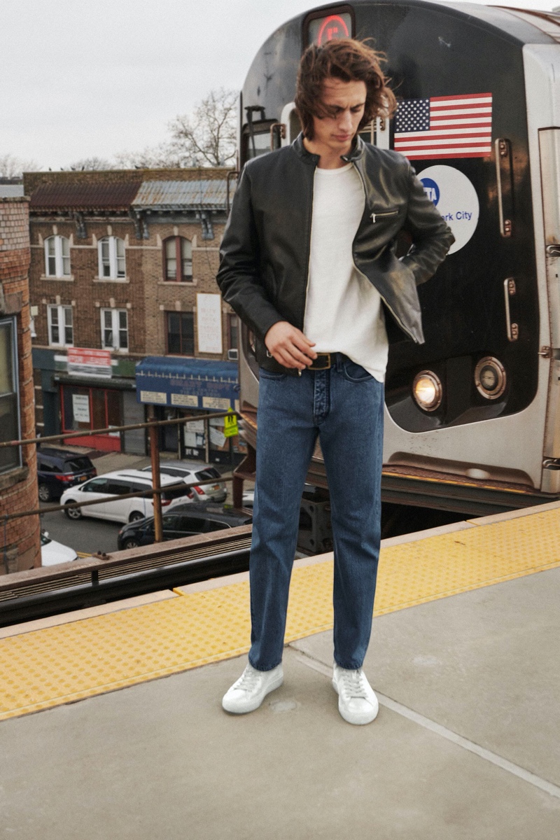 Sporting a leather jacket, white tee, and dark rinse jeans, James Turlington stars in Rag & Bone's spring-summer 2020 campaign.