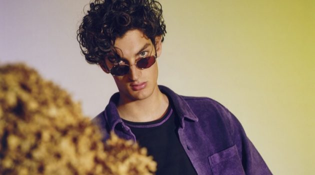 Aaron Embraces Relaxed Style in Reserved Spring '20 Re Design Collection Aaron Shandel rocks a purple mélange jersey shirt from Reserved's Re Design collection.