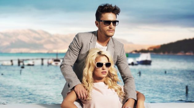 Take a Look at the March Fashion Style Guide Stylish Couple Man Suit Woman Pink Top Sunglasses