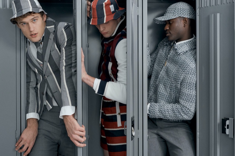 Stuffed into lockers, models Conor Fay, Rocky Harwood, and Charles Oduro don looks from the Thom Browne x Nordstrom Concept 009 collection.