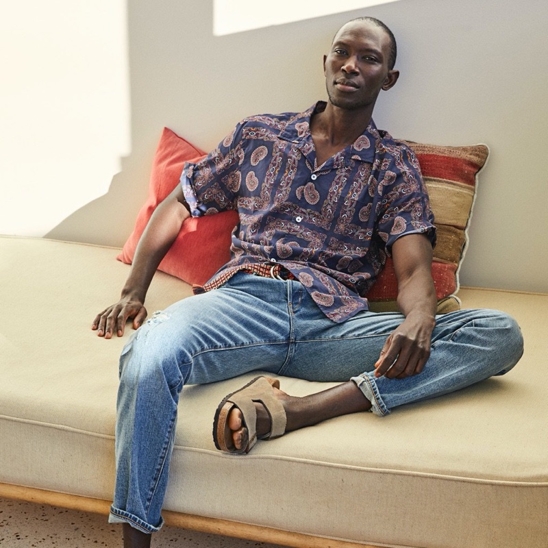 Relaxing, Armando Cabral sports a Todd Snyder bandana print camp collar shirt.