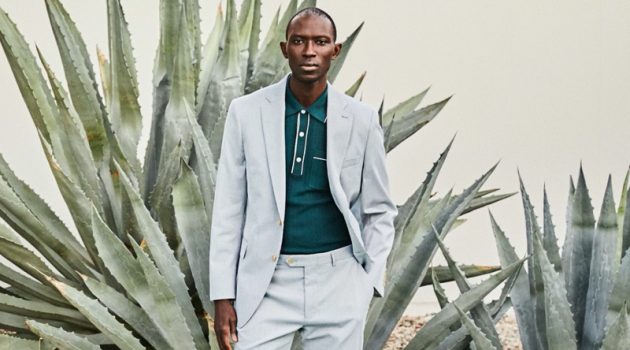 Armando Cabral Dons Palm Springs-Inspired Style from Todd Snyder A smart vision, Armando Cabral wears a Todd Snyder Italian cotton silk tipped ribbed polo sweater in green with a Todd Snyder Black Label Sutton fine corded suit.