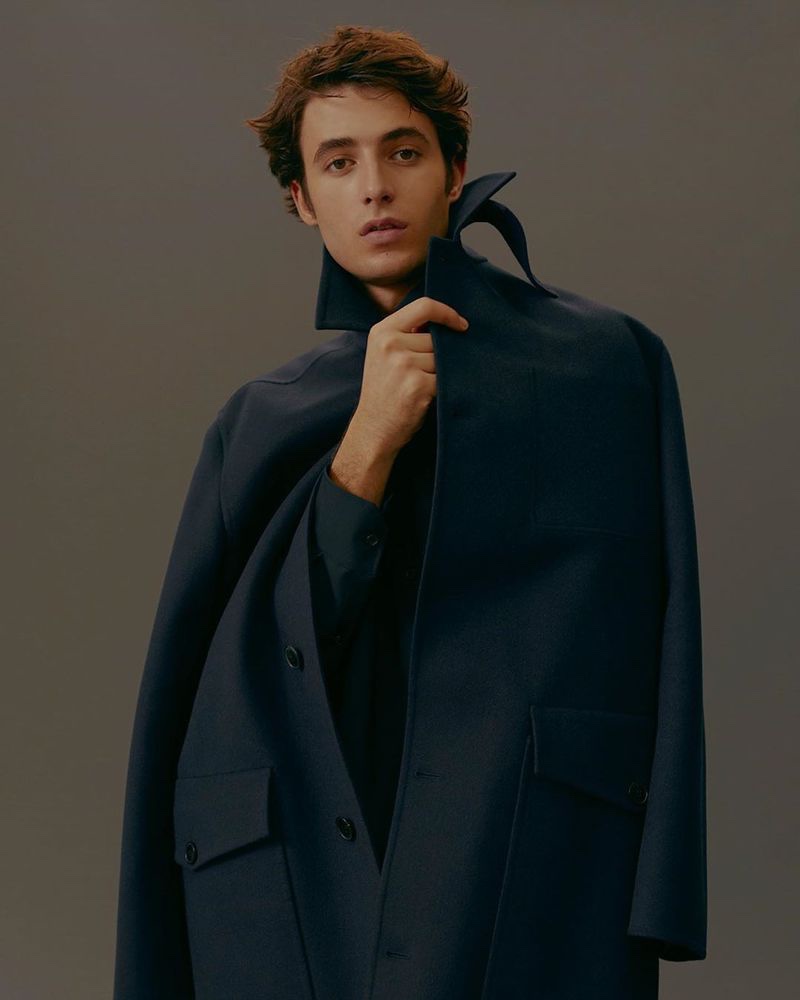 Oscar Kindelan dons a Valentino wool and cashmere-blend coat from Mytheresa.