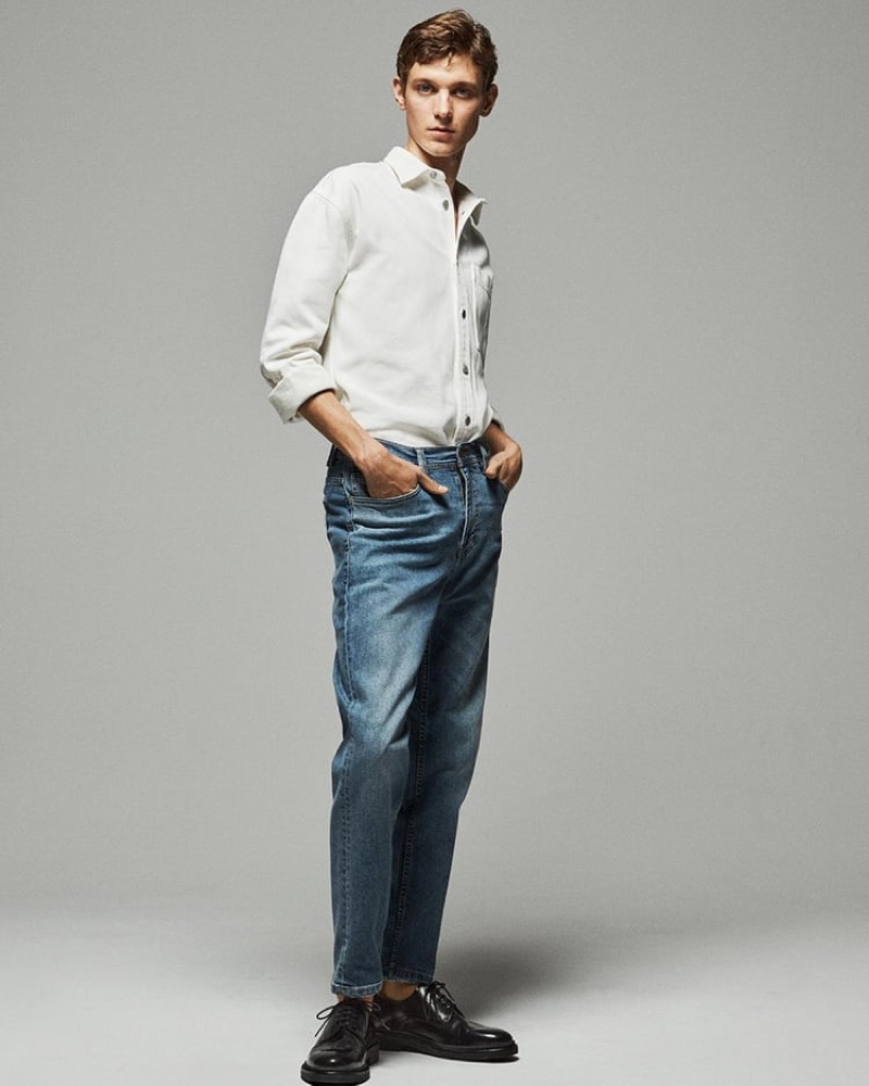 Denim jeans look great with a classic button-down and polished dress shoes.