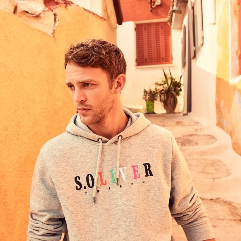 Sporting a s.Oliver hoodie, Guillaume Babouin fronts the label's spring-summer 2020 campaign.