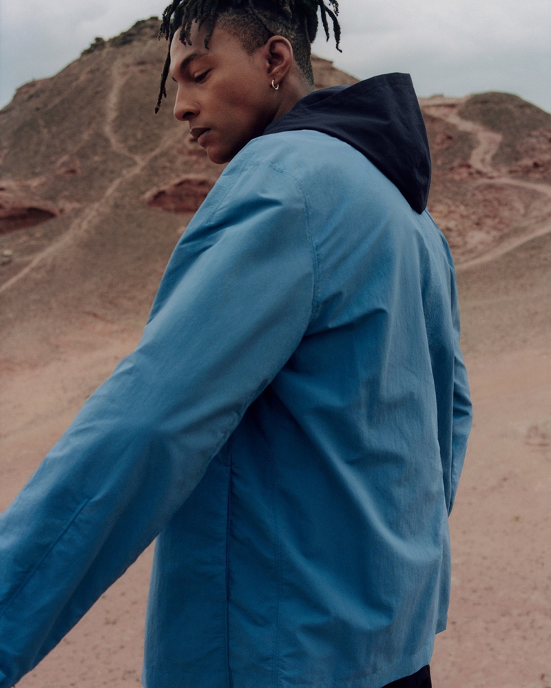 Sporting a cotton bomber jacket, Ty Ogunkoya connects with COS for spring-summer 2020.