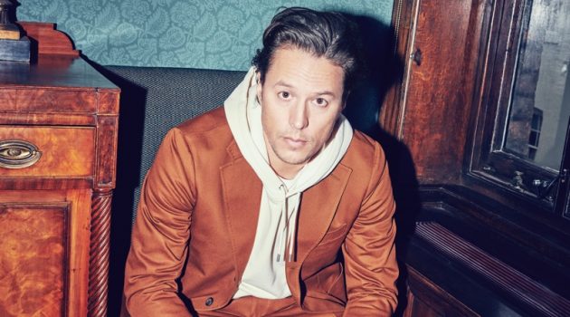 Cary Joji Fukunaga Connects with Mr Porter for Stylish Round of Questions Adding a relaxed attitude to an Aimé Leon Dore + Drake's brown suit, Cary Joji Fukunaga also wears a Café Kitsuné cotton-jersey hoodie, and Acne Studios sneakers.