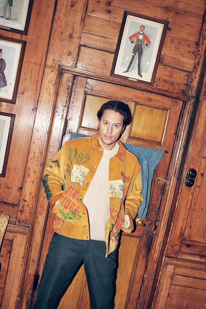 Connecting with Mr Porter, Cary Joji Fukunaga wears a Bode hand-illustrated corduroy jacket with a Gucci cable-knit sweater and tapered trousers.