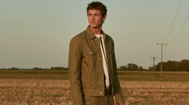 Taking to a field, Rutger Schoone appears in a striking image for Closed's spring-summer 2020 campaign.