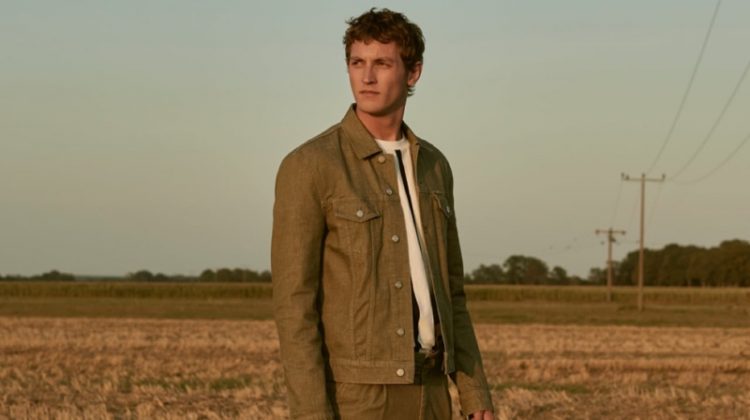 Taking to a field, Rutger Schoone appears in a striking image for Closed's spring-summer 2020 campaign.