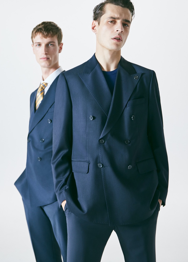 Egon Van Praet and Adrien Sahores don navy double-breasted suits for Damat Tween's spring-summer 2020 campaign.