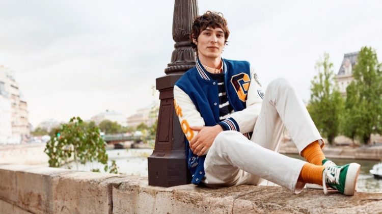 Dylan Fender sports a preppy varsity jacket for GANT's spring 2020 campaign.