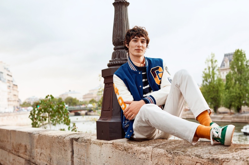 Dylan Fender sports a preppy varsity jacket for GANT's spring 2020 campaign.