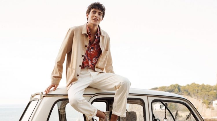 Oscar Kindelan is a smart vision in a workwear-inspired jacket and tropical print shirt for GANT's spring-summer 2020 campaign.