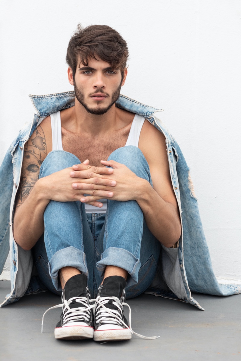 Model Gustavo Grellet sits for a portrait lensed by photographer Matheus Pereira. 