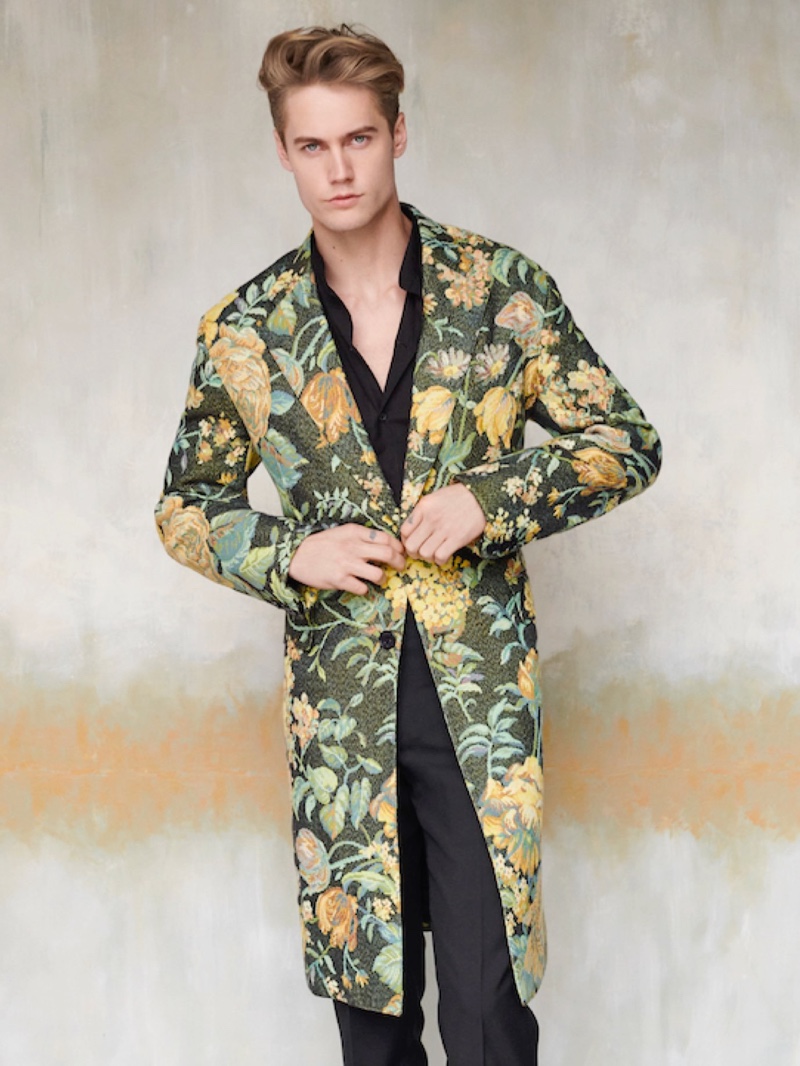 The floral trend is front and center as Neels Visser sports a Givenchy jacquard coat from Holt Renfrew.