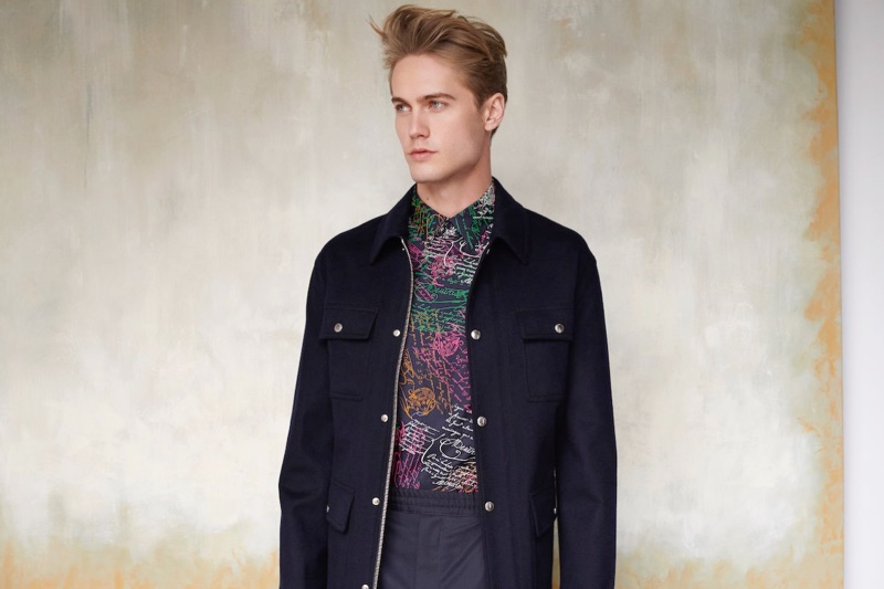 Embracing a graphic statement, Neels Visser models a Berluti jacquard shirt and field jacket for Holt Renfrew.