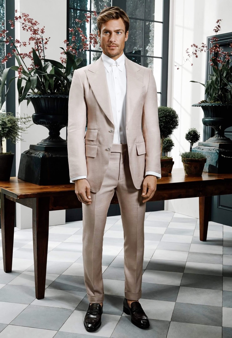 Jason Morgan is a dapper vision in a silk suit and leather loafers from Tom Ford for Holt Renfrew.