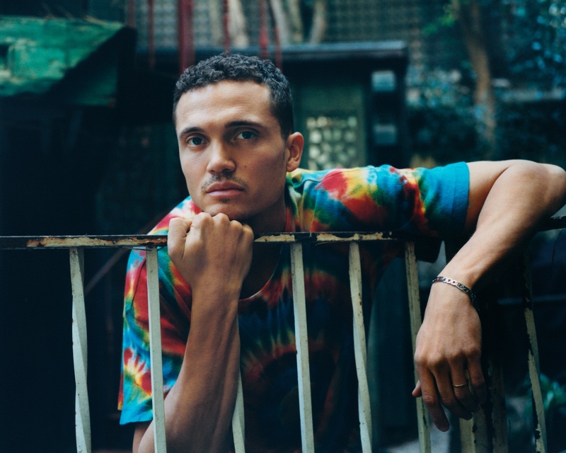 Karl Glusman rocks a tie-dyed cotton and cashmere-blend t-shirt by The Elder Statesman. He also sports an A.P.C. bracelet for his Mr Porter shoot.