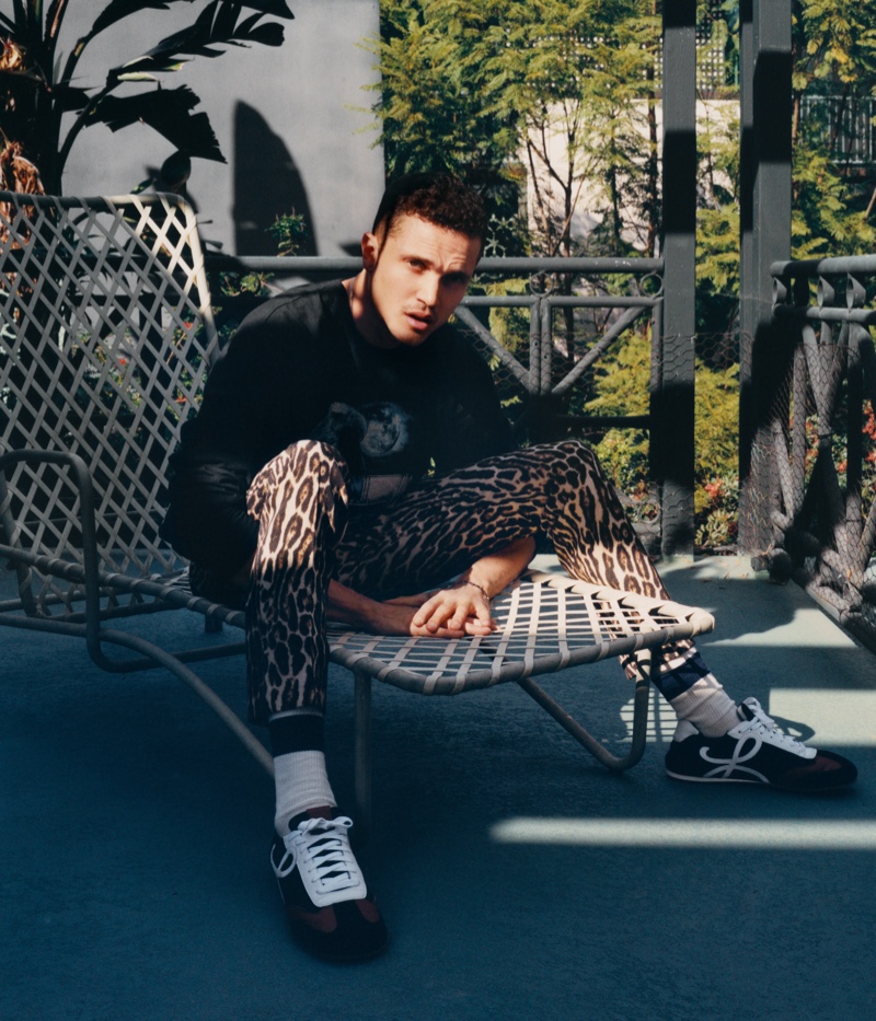 Embracing a streetwear vibe for his Mr Porter shoot, Karl Glusman sports a Rhude t-shirt, Dries Van Noten leopard-print trousers, and Loewe sneakers. » Karl Glusman Stars in Mr Porter Shoot, Talks Style & 'Devs' Embracing a streetwear vibe for his Mr Porter shoot, Karl Glusman sports a Rhude t-shirt, Dries Van Noten leopard-print trousers, and Loewe sneakers.