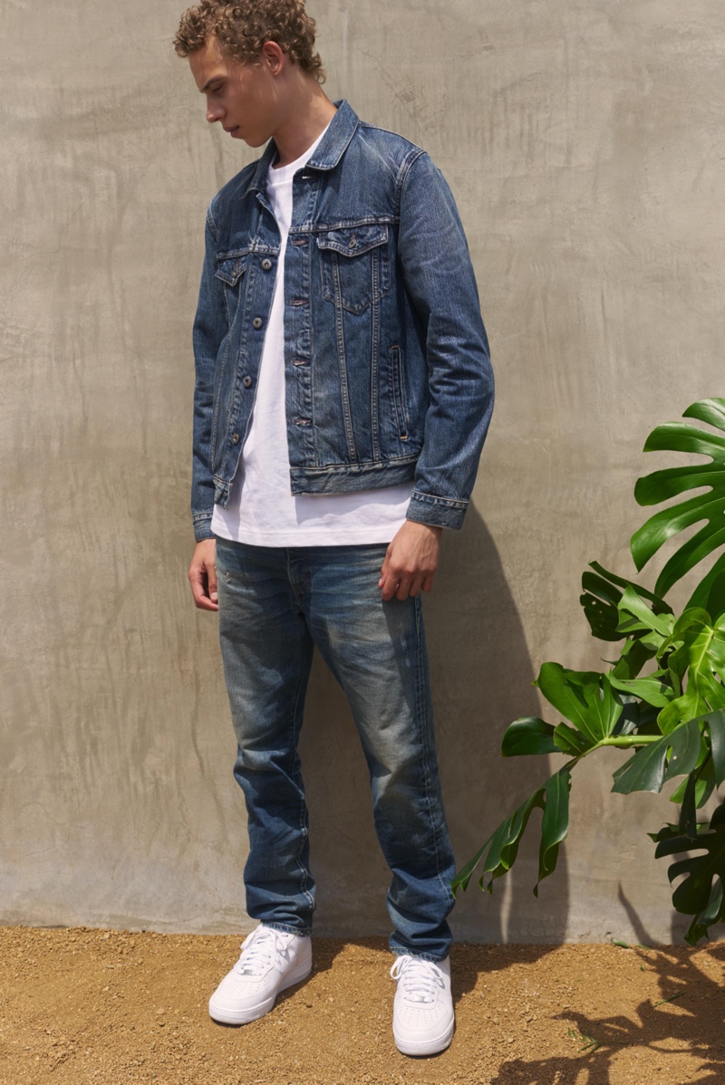 Doubling down on denim, Lye-Amone Cassac wears Levi's Made & Crafted.