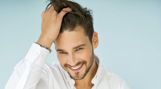 Habits That Change You from the Boy Next Door to the Most-Wanted Bachelor Male Model Smiling
