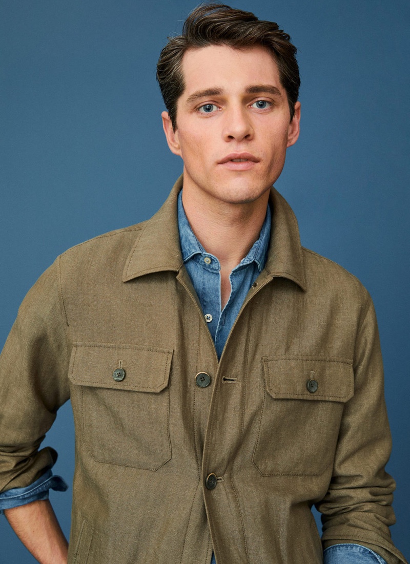 Front and center, Luke Powell dons a linen-cotton blend overshirt from Mango's latest Committed collection.