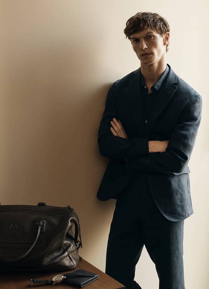 French model Luc Defont-Saviard dons a linen suit from Massimo Dutti.