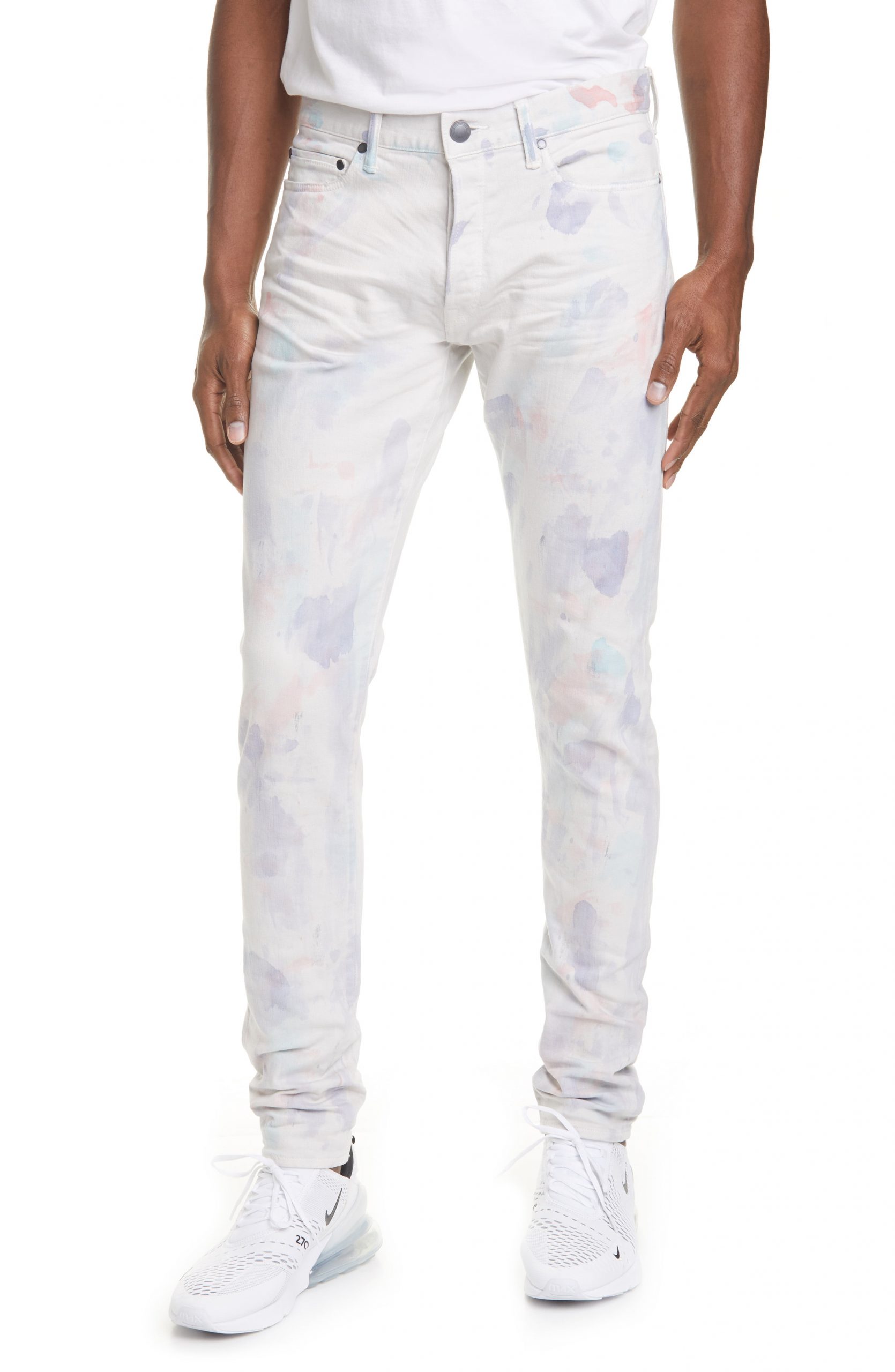 white cut up jeans